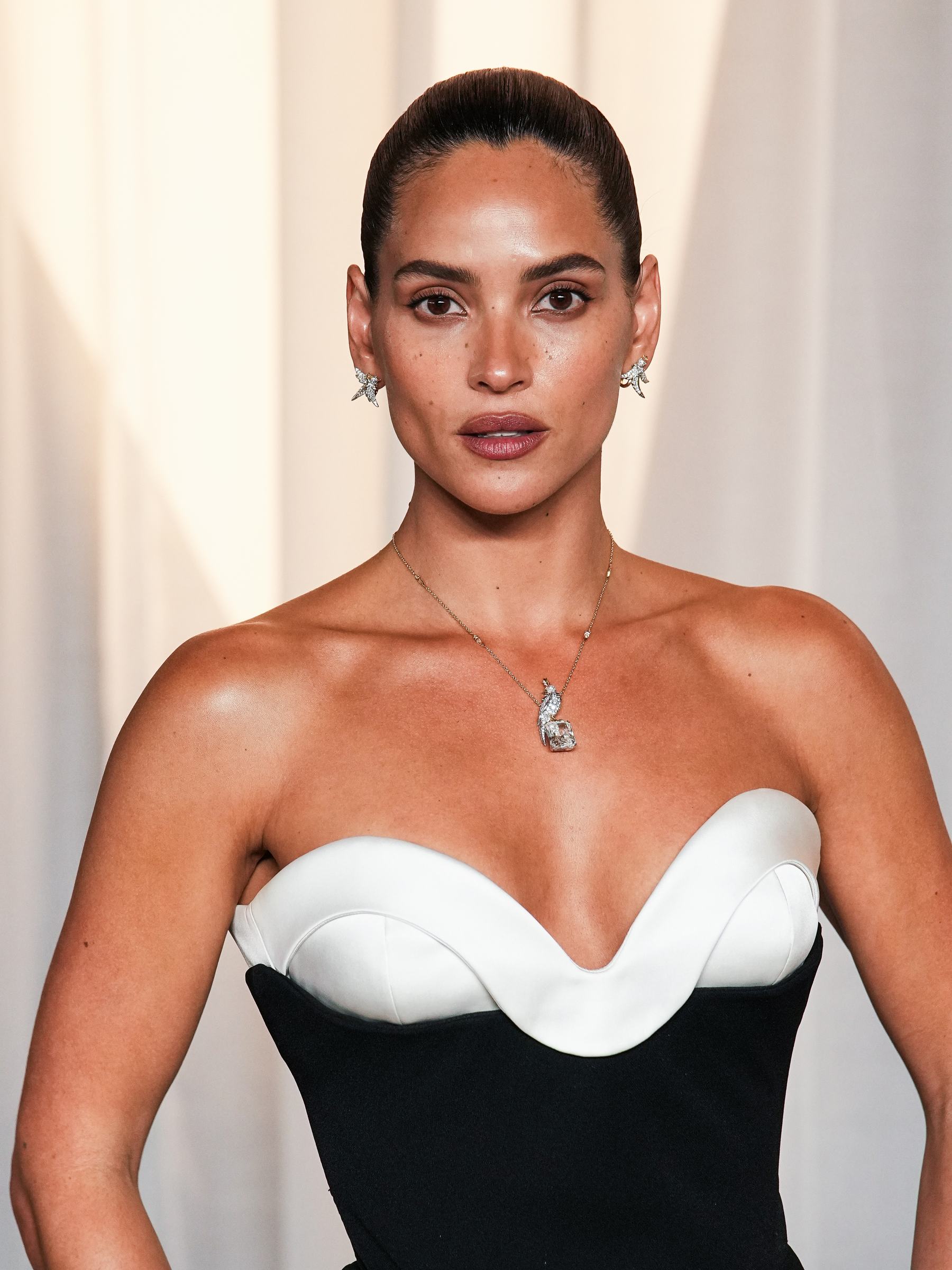 Adria Arjona hands