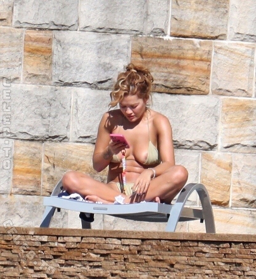 Rita Ora butts