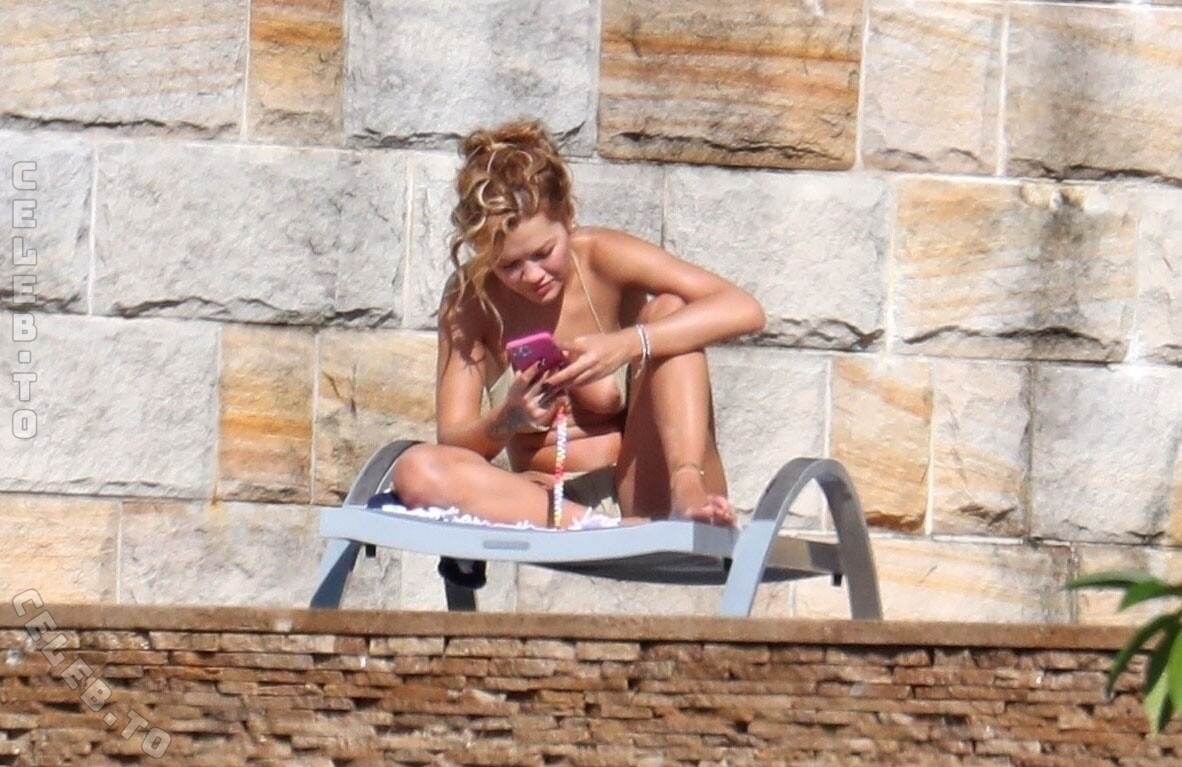 Rita Ora butts